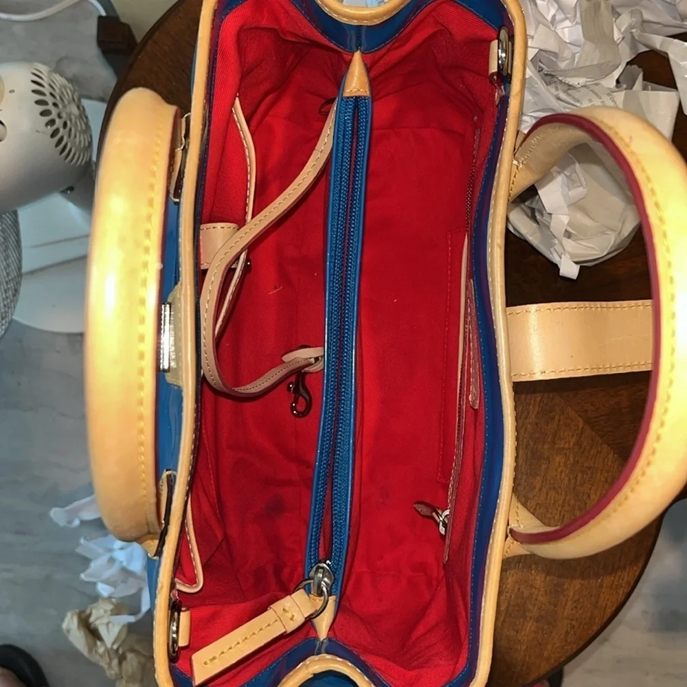Dooney & Bourke  Satchel  Royal blue coated canvas/ tan leather trim   Like New